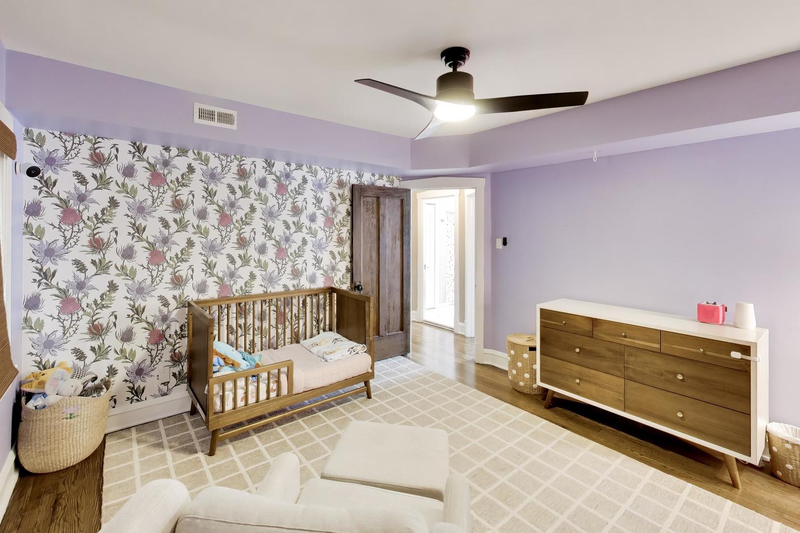 6101 West Patterson Avenue Chicago, IL 60634 - Photo 21 of 40 a bed room with a bed and a couch