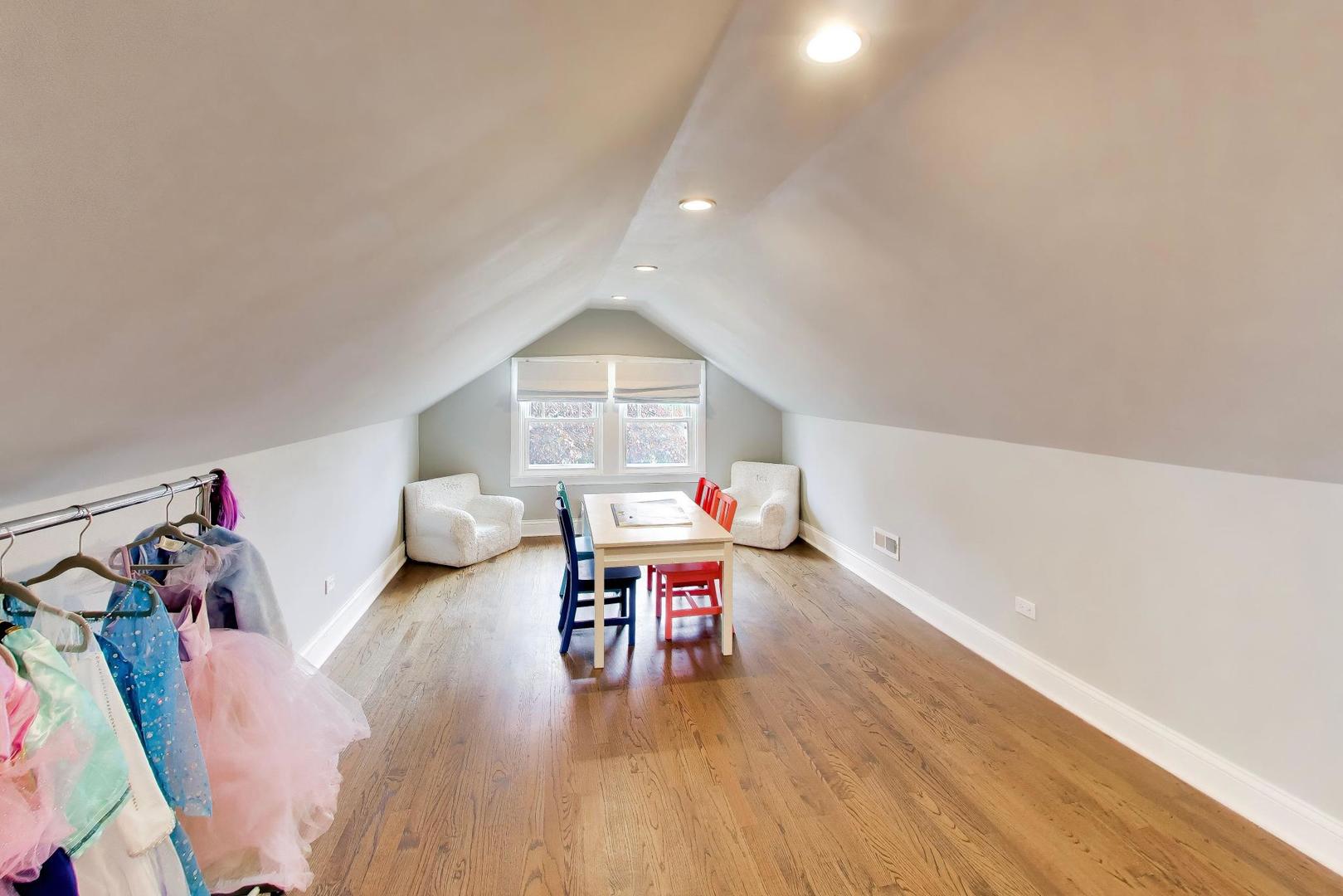 6101 West Patterson Avenue Chicago, IL 60634 - Photo 25 of 40 a living room with furniture and a wooden floor