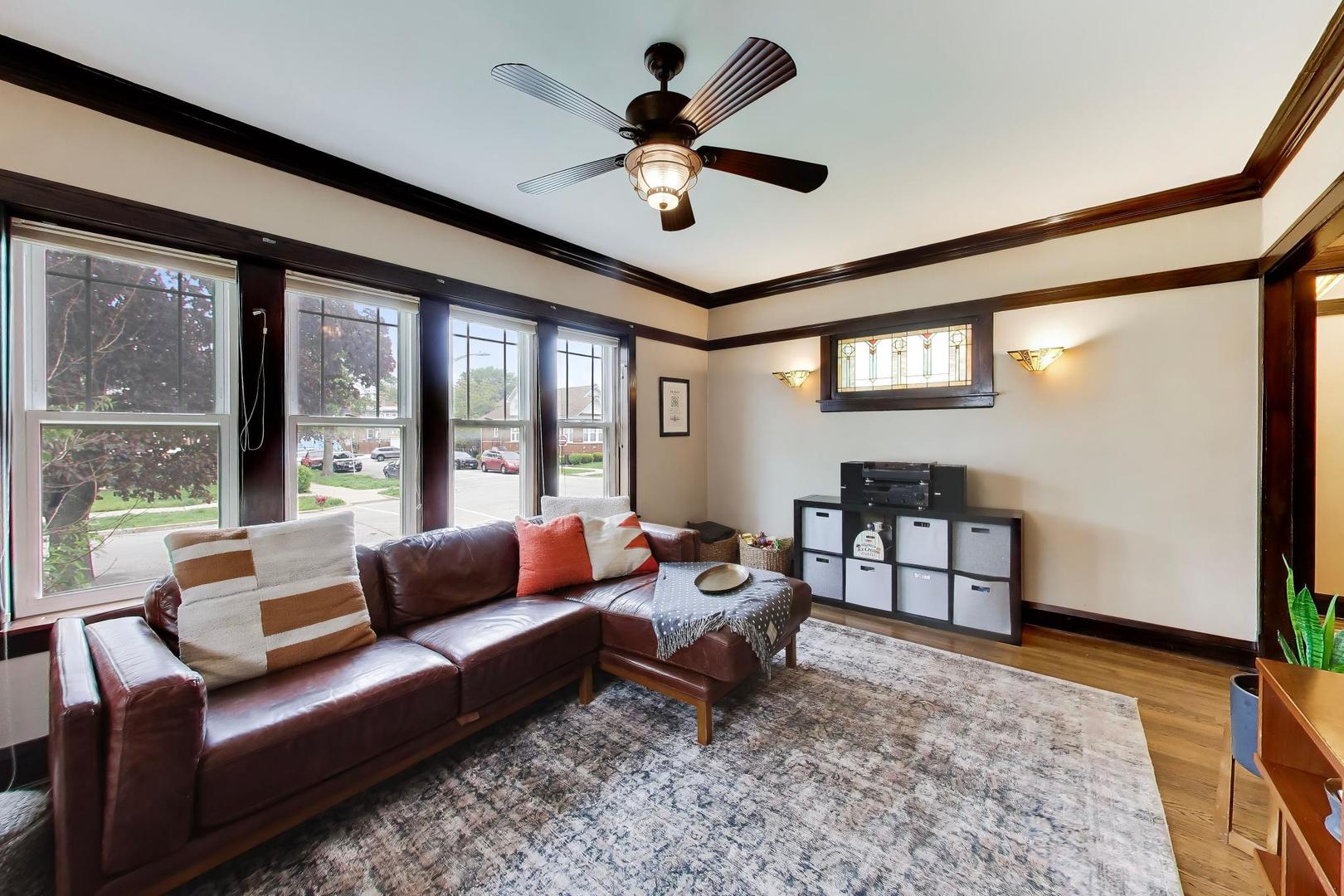 6101 West Patterson Avenue Chicago, IL 60634 - Photo 7 of 40 a living room with furniture and a large window
