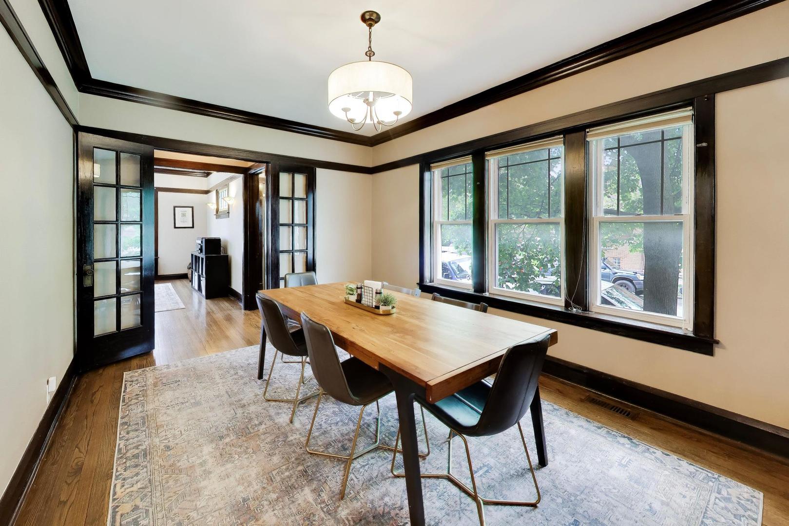 6101 West Patterson Avenue Chicago, IL 60634 - Photo 9 of 40 a view of a dining room with furniture window and wooden floor