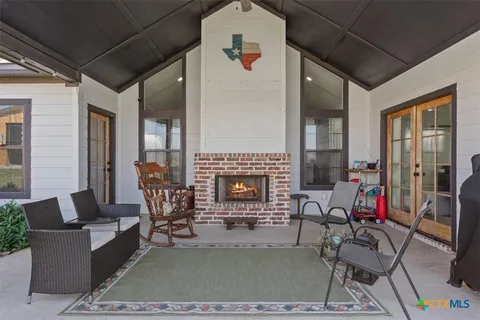 a view of a big room with a big yard and plants