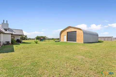 a view of a garage with furniture