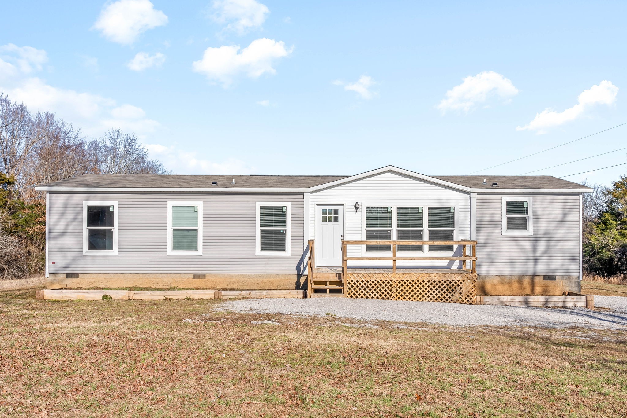842 Pleasant Greenhill Road Crofton, KY 42217 - Photo 1 of 29 a front view of a house with a yard