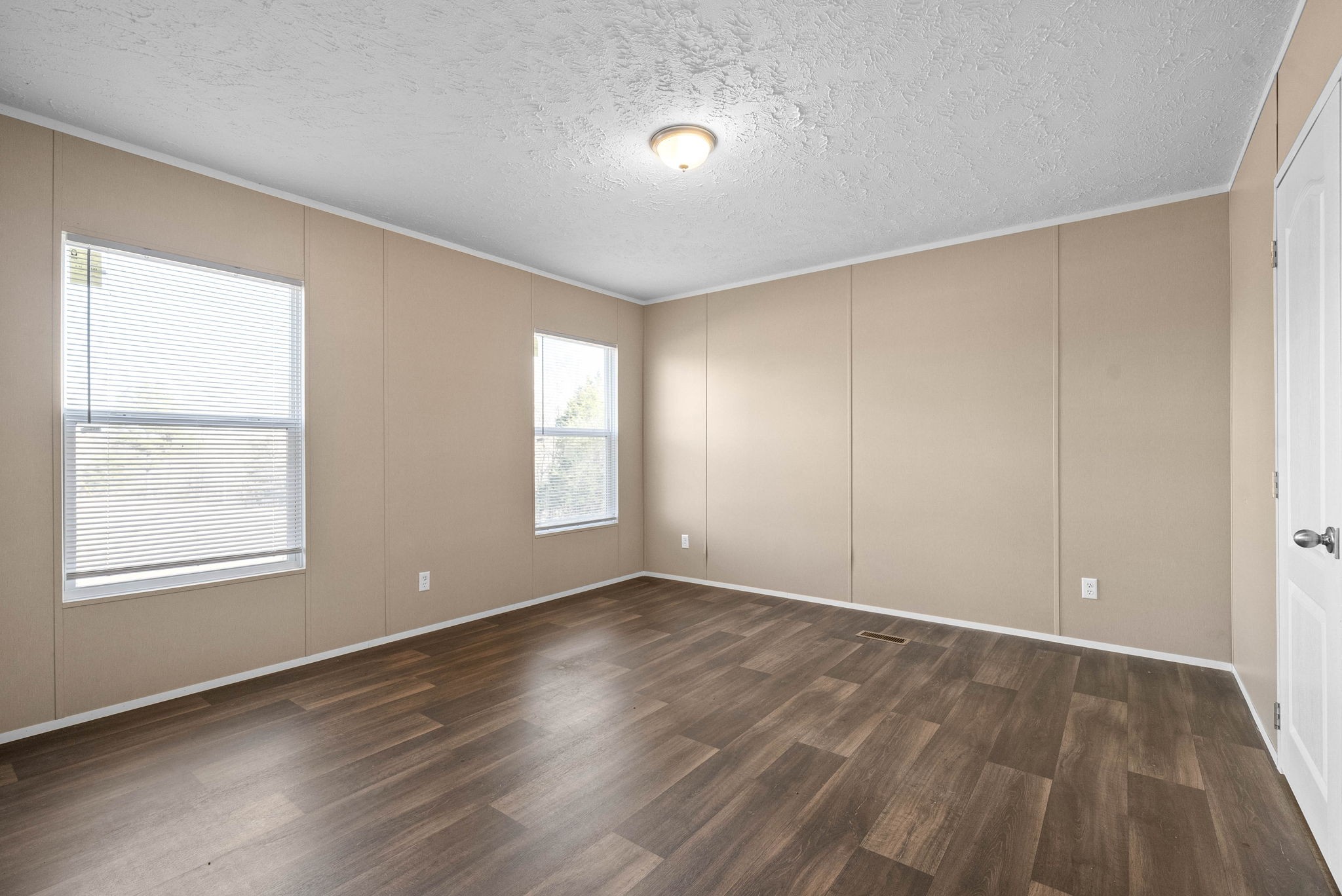 842 Pleasant Greenhill Road Crofton, KY 42217 - Photo 15 of 29 an empty room with wooden floor and windows