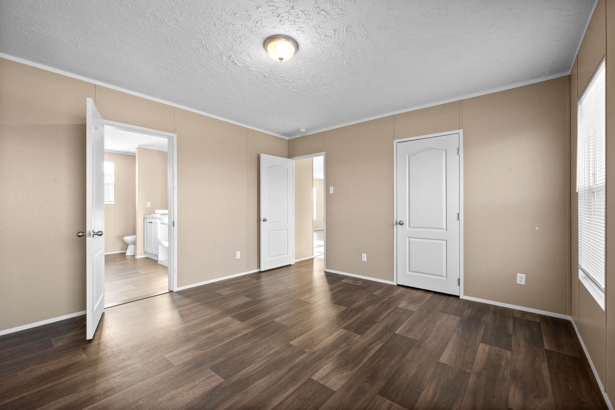 842 Pleasant Greenhill Road Crofton, KY 42217 - Photo 16 of 29 a view of an empty room with wooden floor and a window