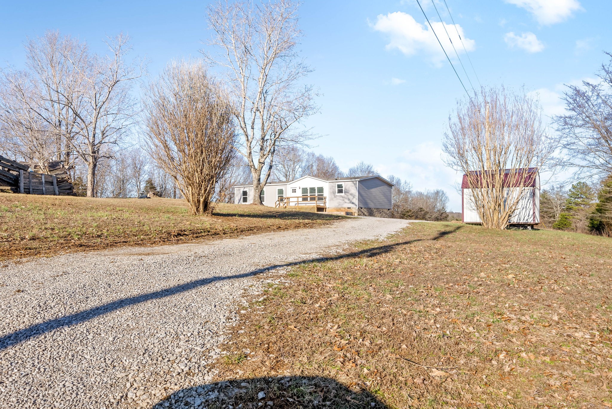 842 Pleasant Greenhill Road Crofton, KY 42217 - Photo 24 of 29 a view of road with large trees