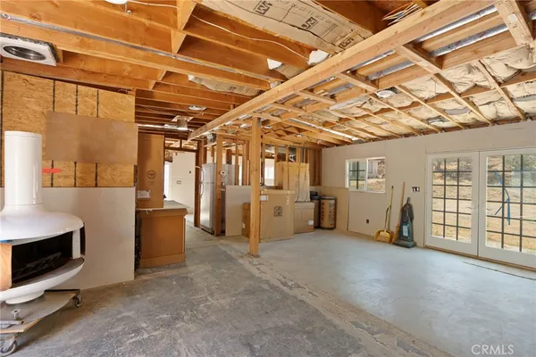 a view of a room with wooden walls