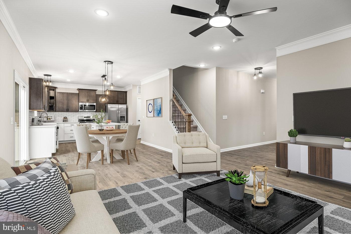 12413 Toll House Road Spotsylvania, VA 22551 - Photo 2 of 68 a living room with furniture and a flat screen tv