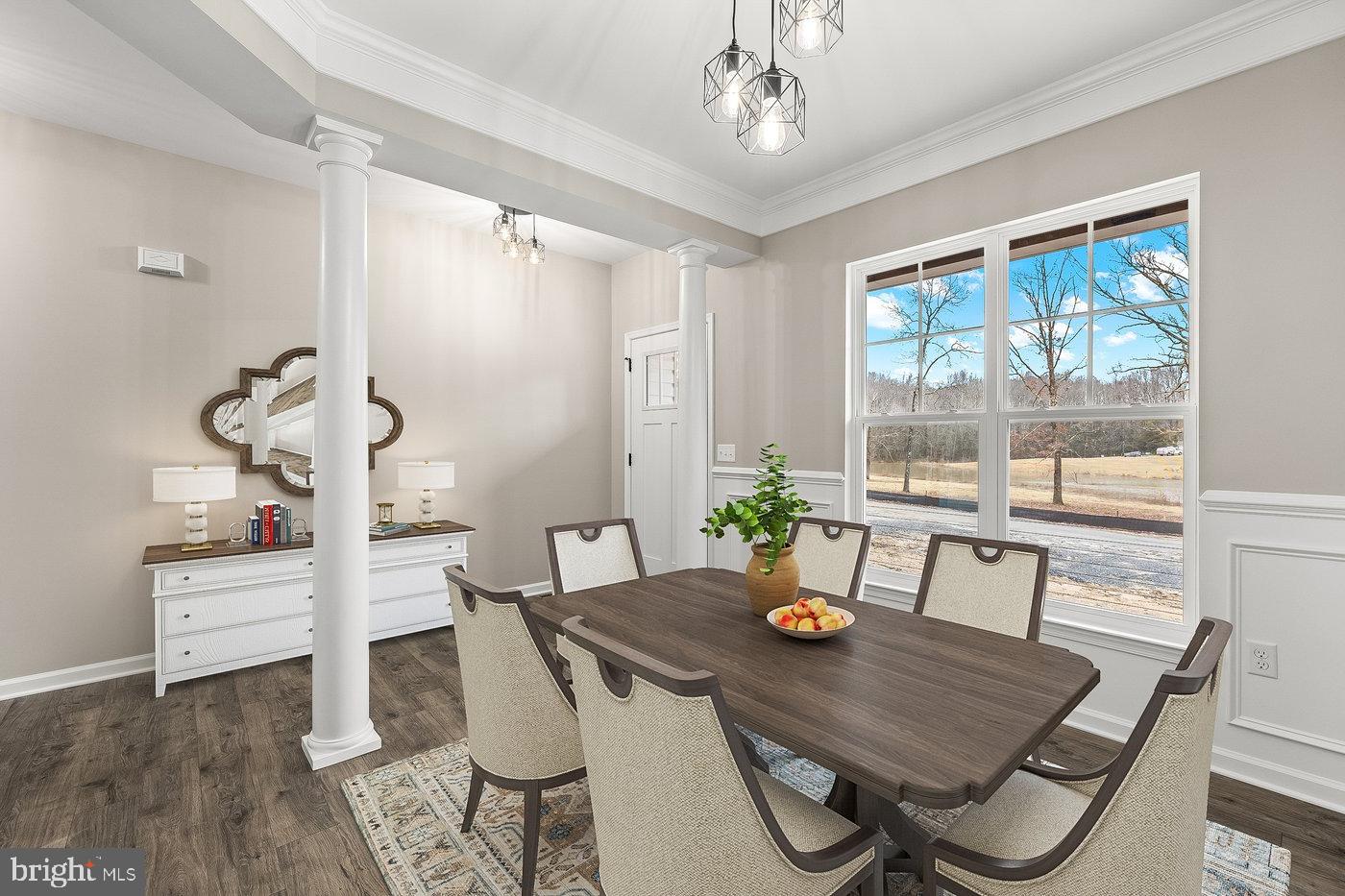 12413 Toll House Road Spotsylvania, VA 22551 - Photo 3 of 68 a view of a dining room with furniture window and wooden floor