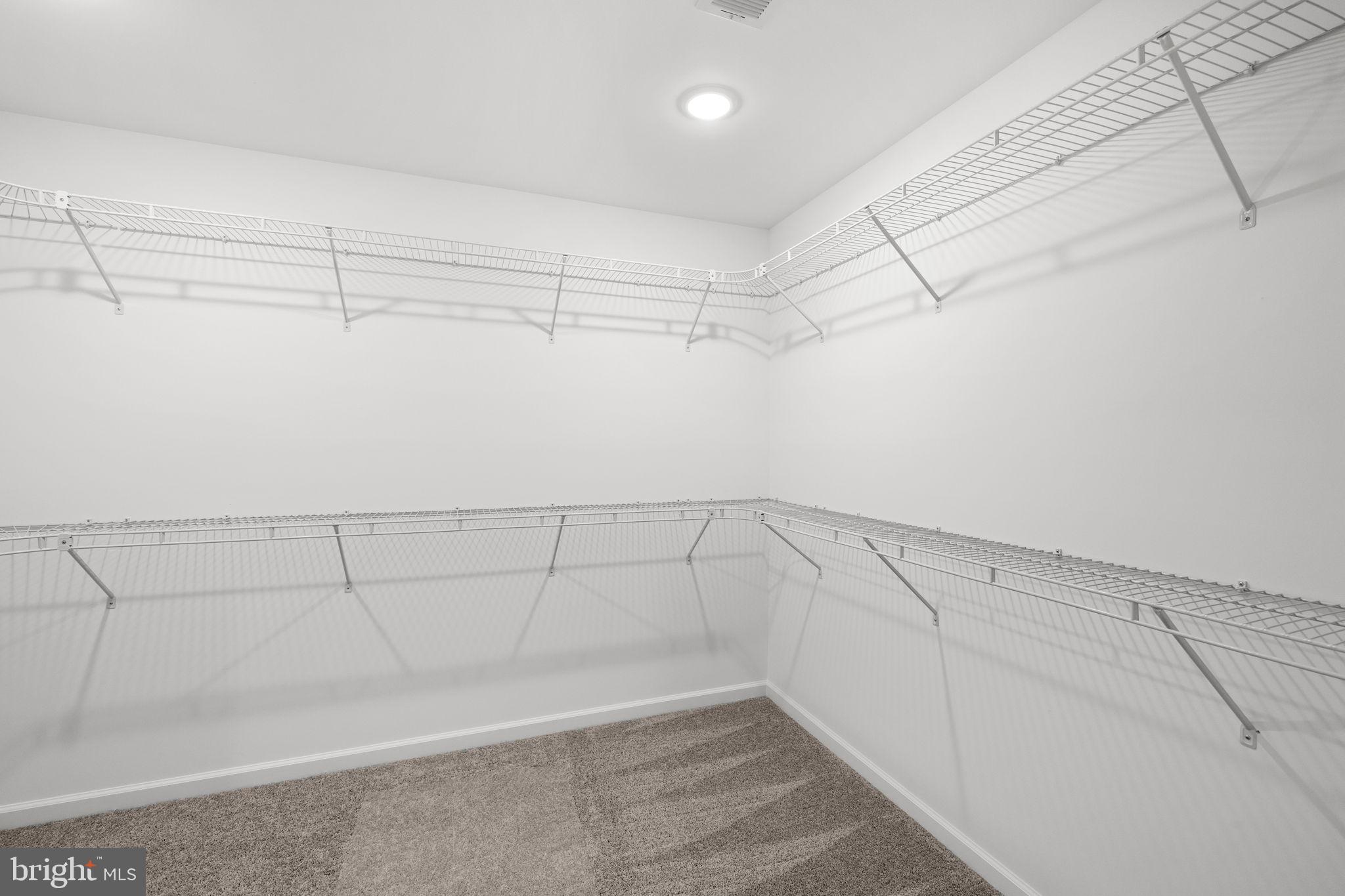 12413 Toll House Road Spotsylvania, VA 22551 - Photo 37 of 68 a view of a room with racks on the wall