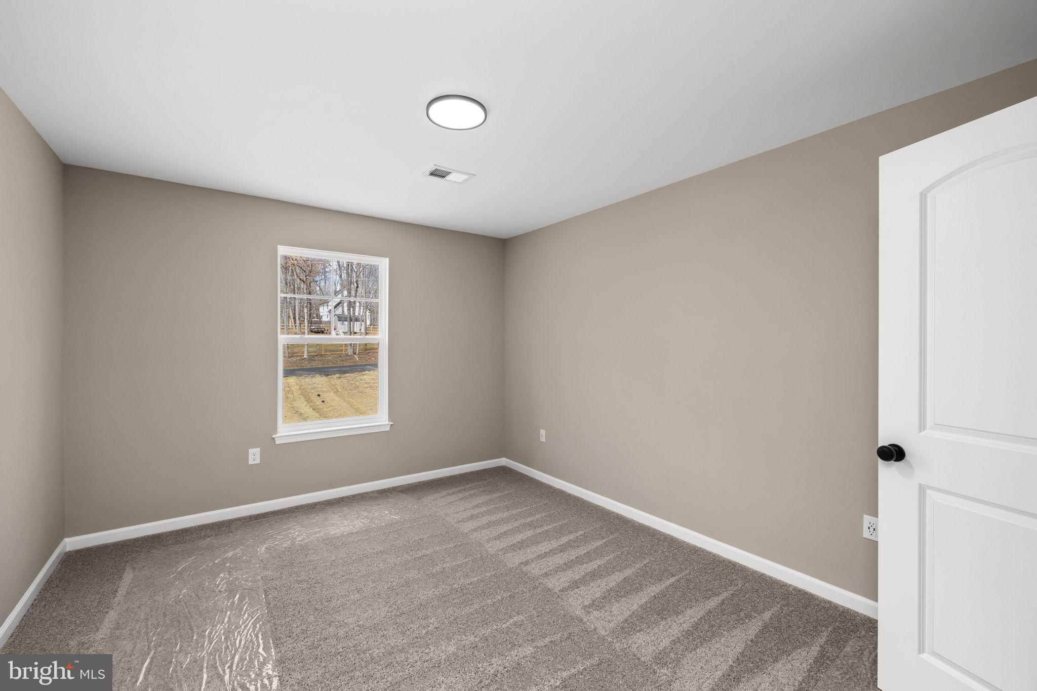 12413 Toll House Road Spotsylvania, VA 22551 - Photo 39 of 68 an empty room with a window