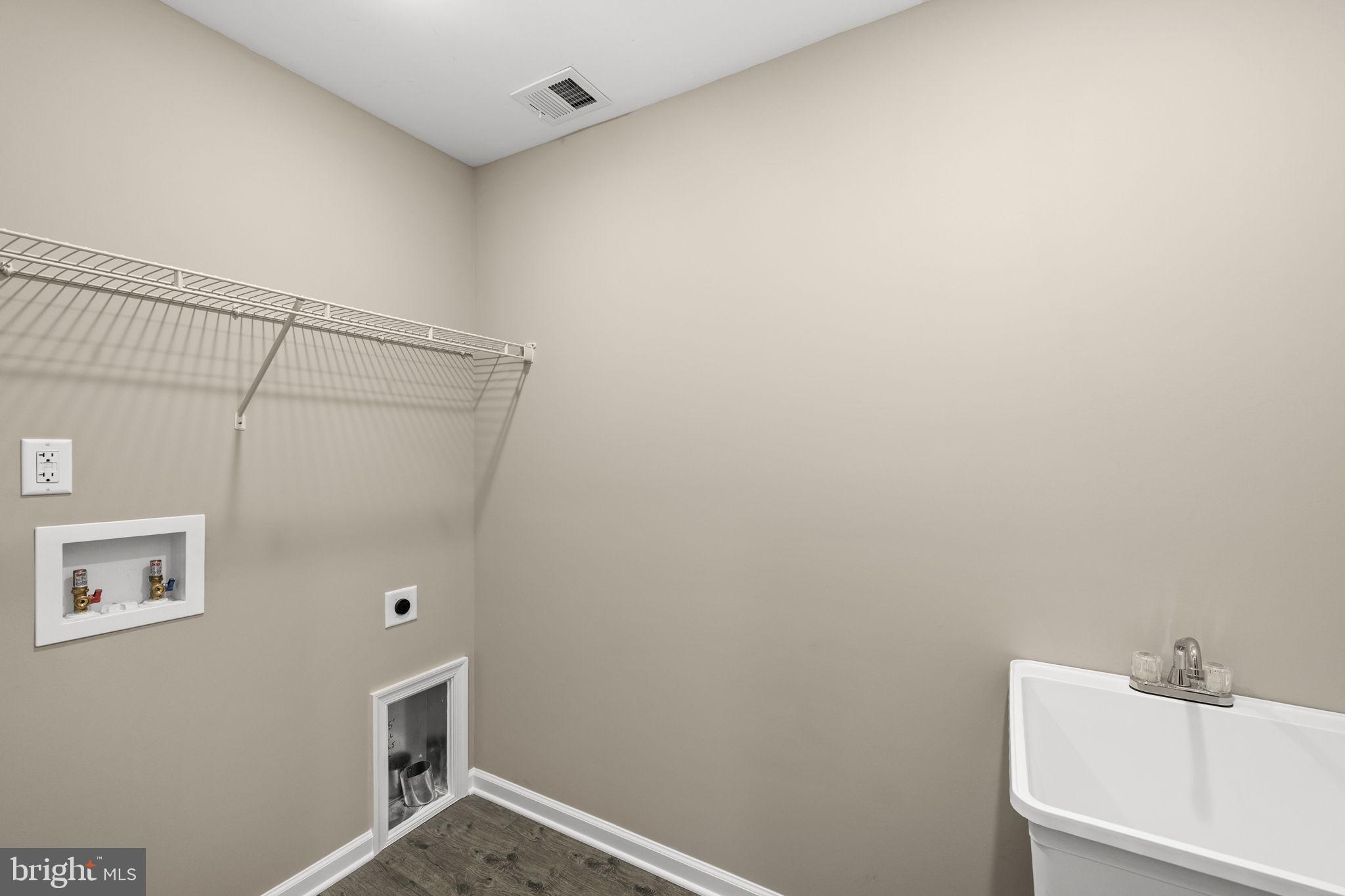 12413 Toll House Road Spotsylvania, VA 22551 - Photo 40 of 68 a bathroom with a shower and a sink