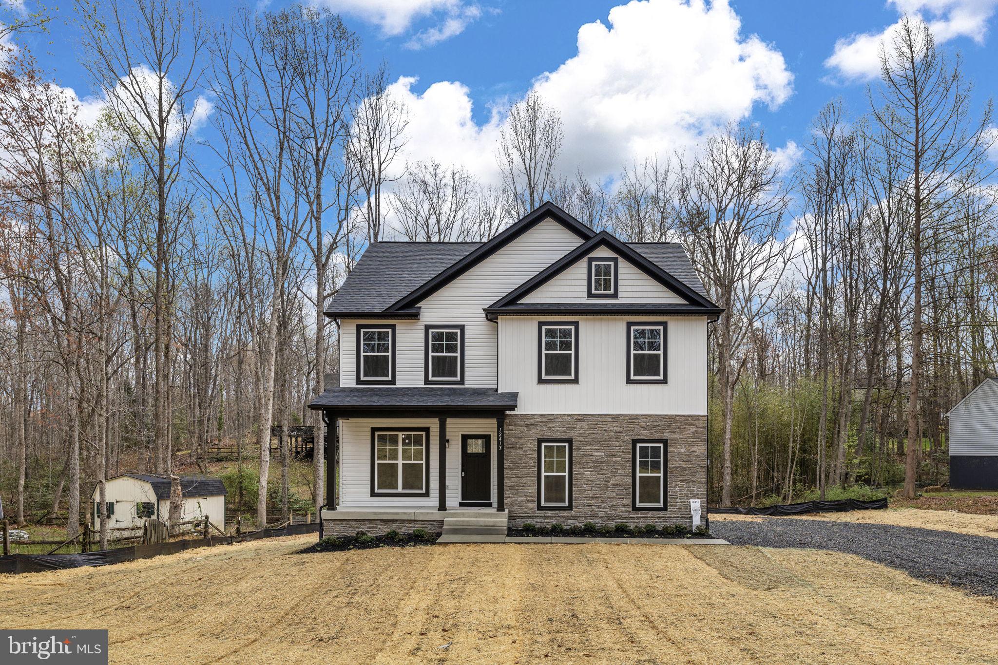 12413 Toll House Road Spotsylvania, VA 22551 - Photo 44 of 68 a front view of a house with a yard