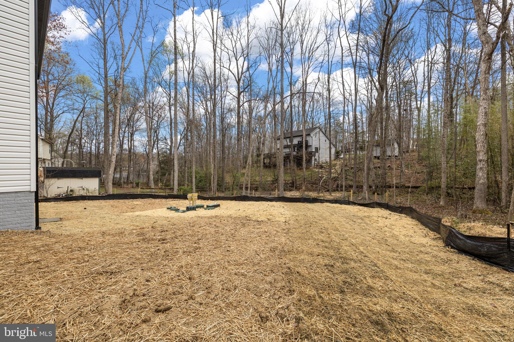 12413 Toll House Road Spotsylvania, VA 22551 - Photo 47 of 68 a view of a backyard of a house