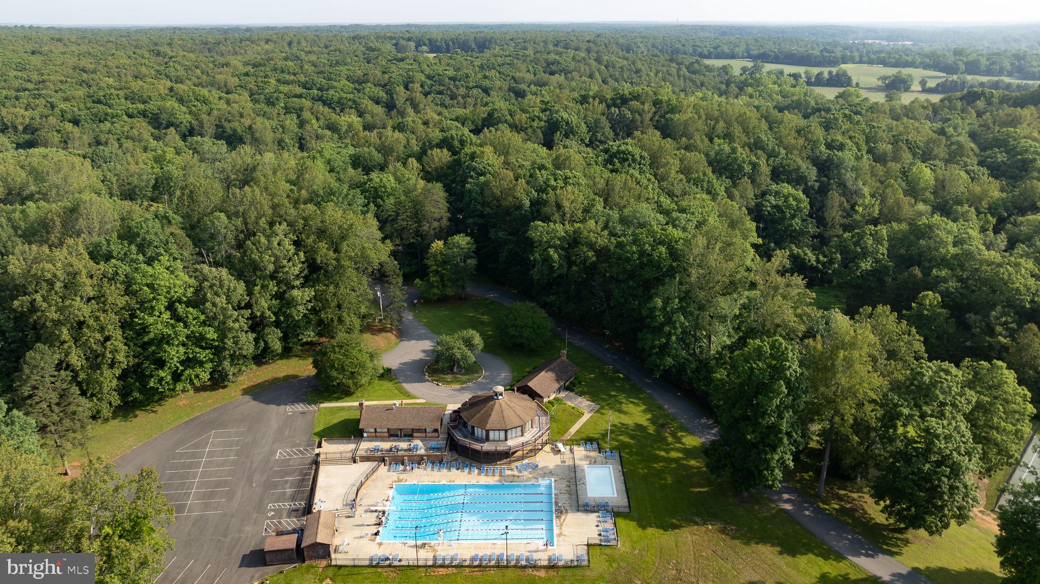 12413 Toll House Road Spotsylvania, VA 22551 - Photo 57 of 68 an aerial view of a house with a yard