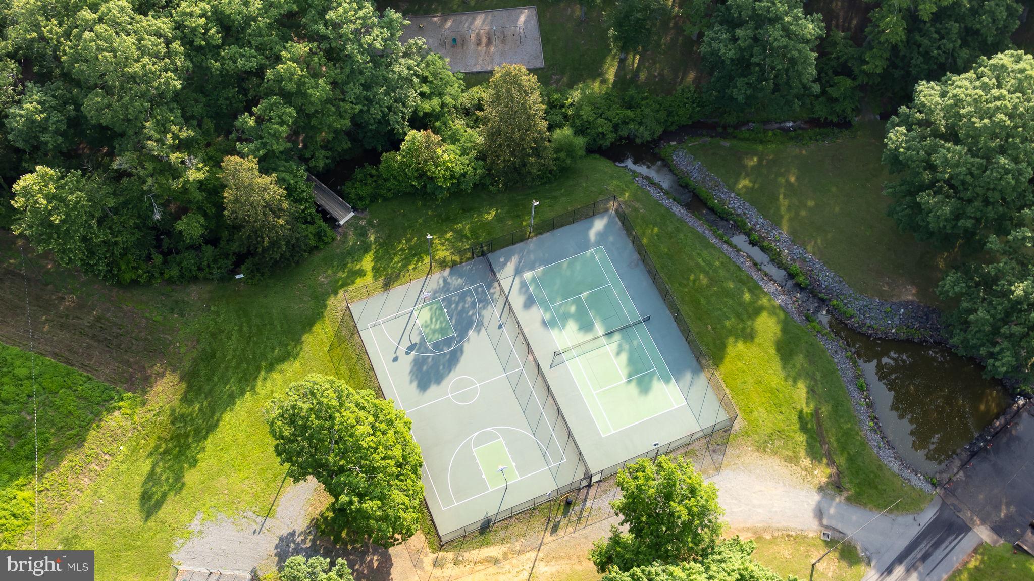 12413 Toll House Road Spotsylvania, VA 22551 - Photo 59 of 68 an aerial view of lake residential house with outdoor space and trees all around
