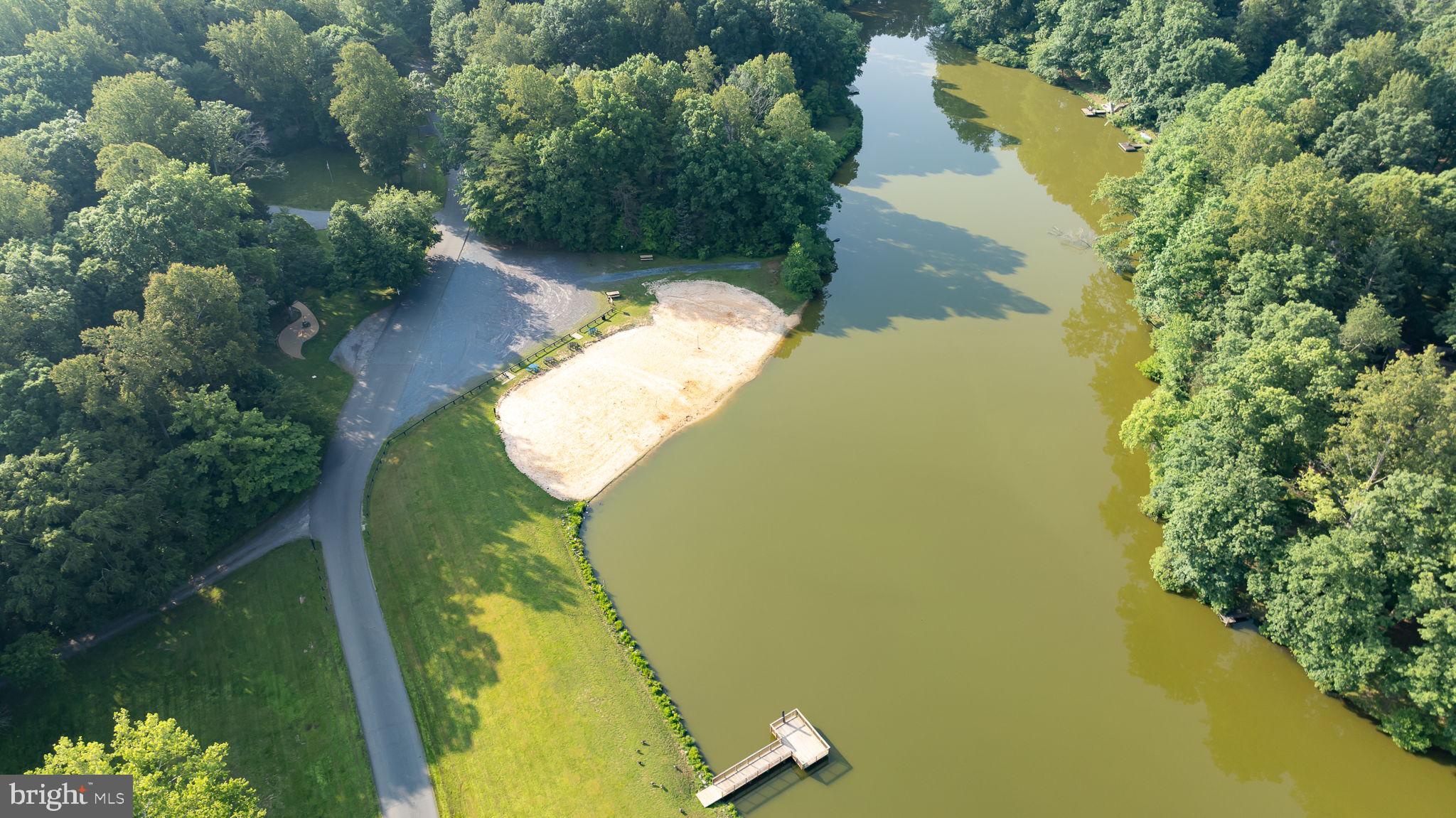12413 Toll House Road Spotsylvania, VA 22551 - Photo 68 of 68 an aerial view of a house with a yard swimming pool and outdoor seating