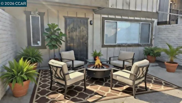 a building outdoor space with patio furniture
