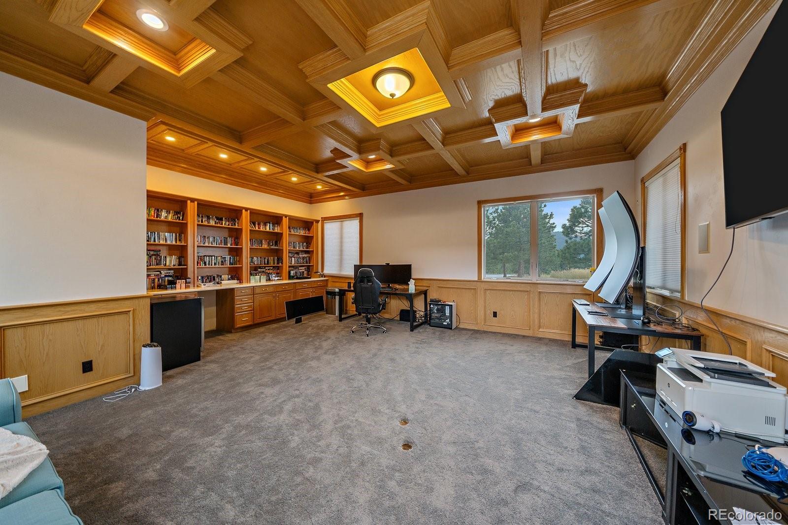 4213 Nambe Road Indian Hills, CO 80454 - Photo 49 of 49 a view of a room with gym equipment