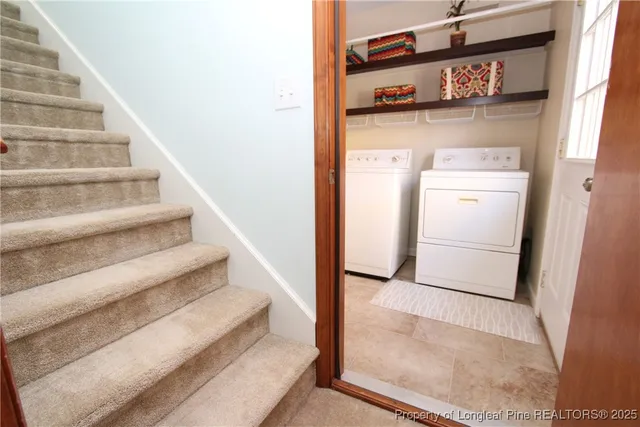 an empty room with a ceiling fan and a window