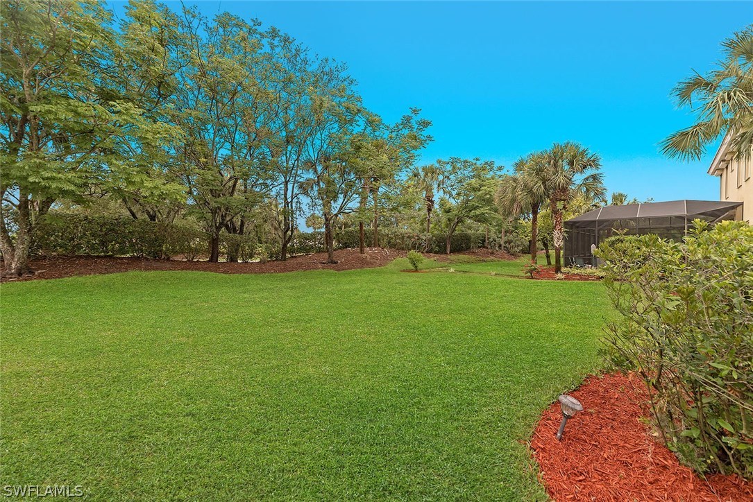 12941 Timber Ridge Drive Fort Myers, FL 33913 - Photo 28 of 30 a view of field with grass and trees