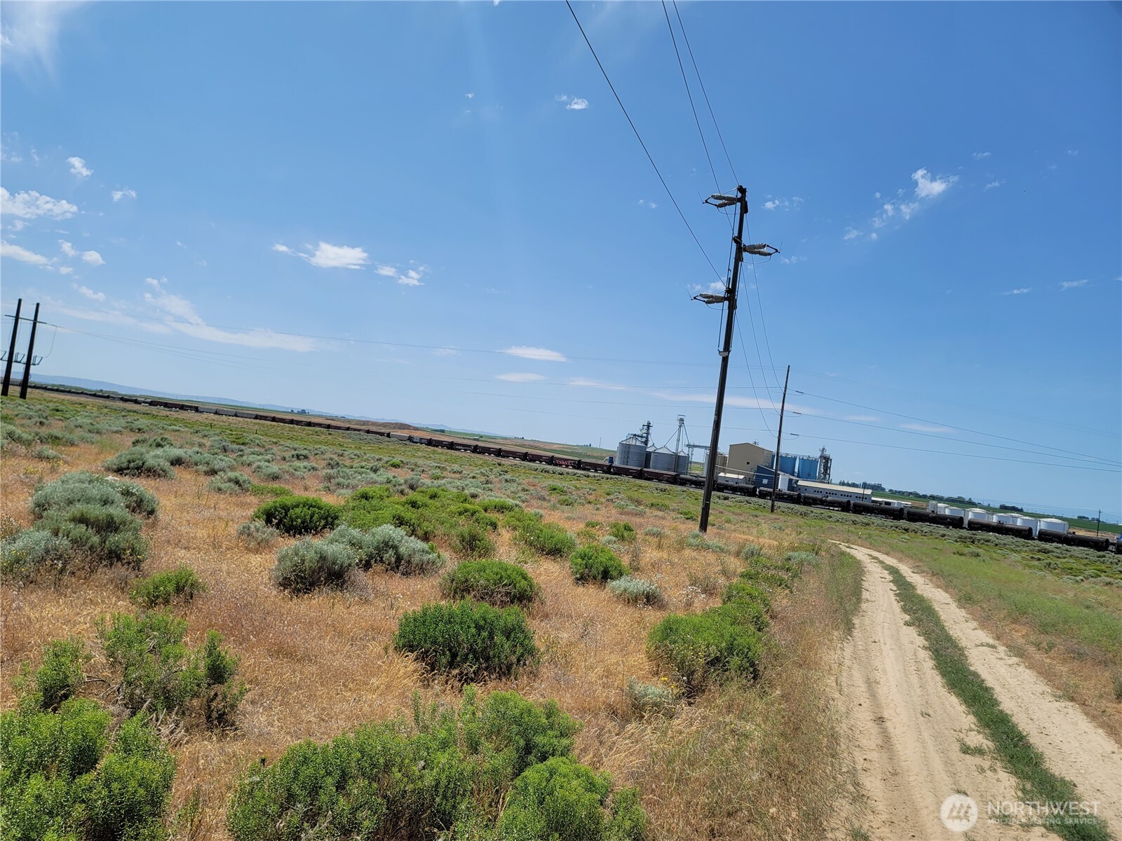 0 Parcel Street West Warden, WA 98857 - Photo 2 of 5 a view of a swimming pool with a yard