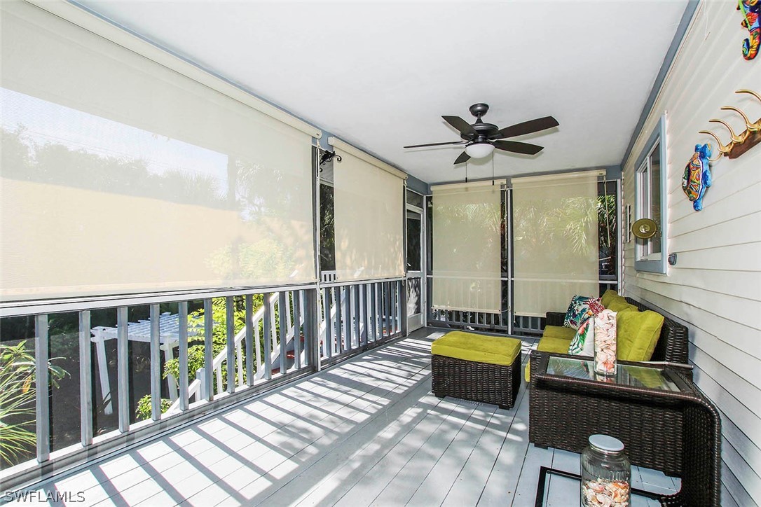 555 Rabbit Road Sanibel, FL 33957 - Photo 18 of 29 a bedroom with bed and a window