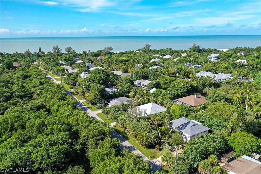 555 Rabbit Road Sanibel, FL 33957 - Photo 25 of 29 a view of a lake with houses
