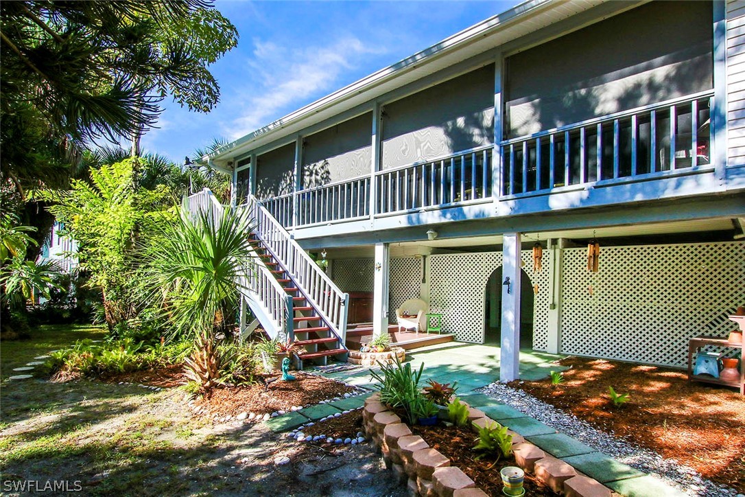 555 Rabbit Road Sanibel, FL 33957 - Photo 28 of 29 a view of a house with a patio