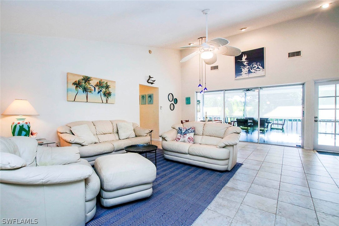 555 Rabbit Road Sanibel, FL 33957 - Photo 7 of 29 a living room with furniture and a large window