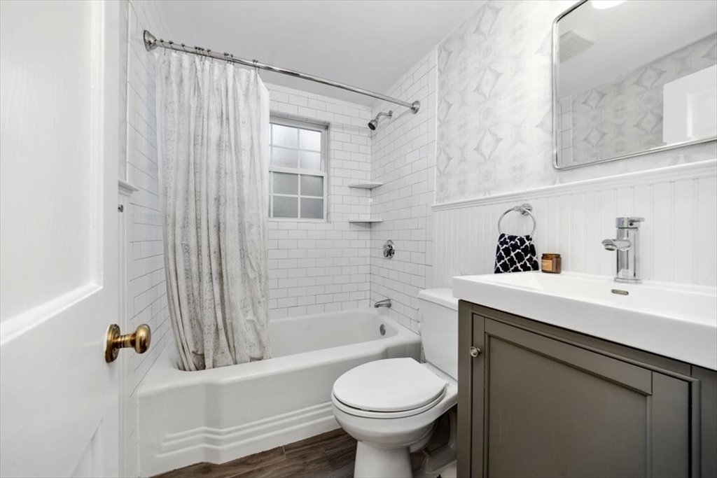 38 Smith Road Hingham, MA 02043 - Photo 13 of 42 a bathroom with a sink toilet and shower