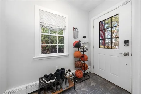 a view of a room with toys and windows