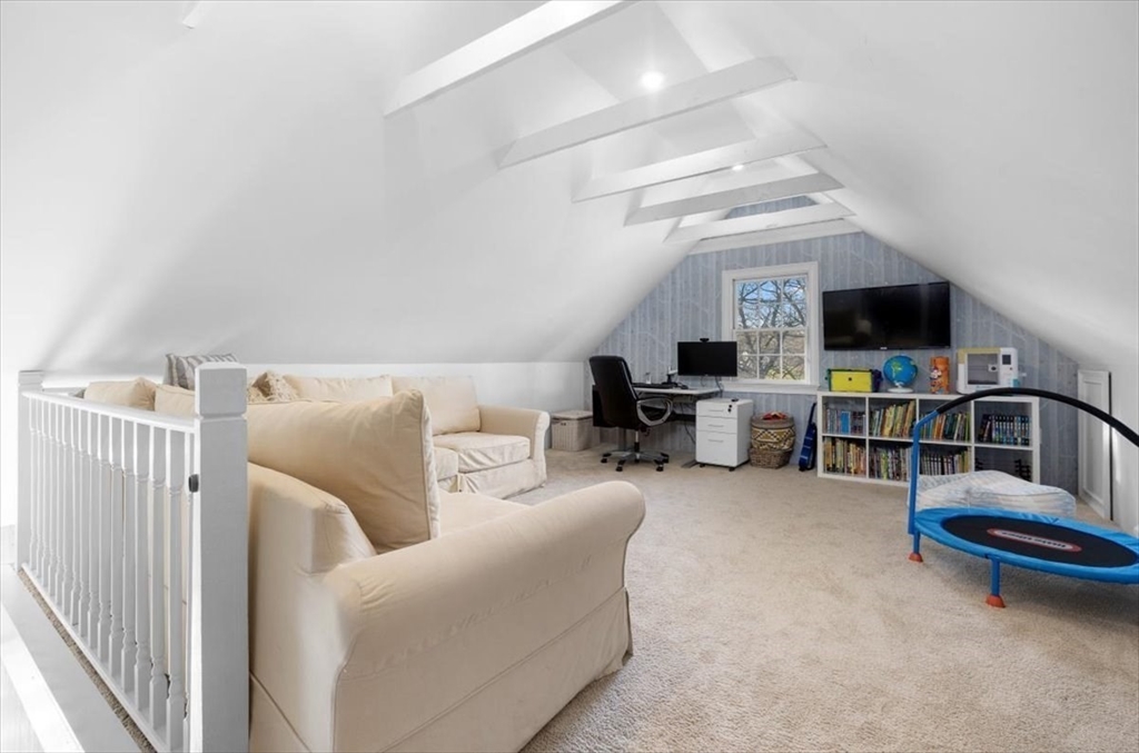 38 Smith Road Hingham, MA 02043 - Photo 19 of 42 a living room with furniture and a flat screen tv