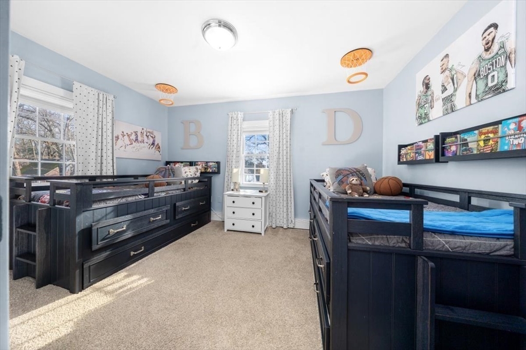 38 Smith Road Hingham, MA 02043 - Photo 21 of 42 a bedroom with a dresser and a window