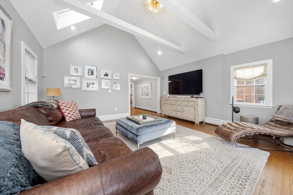 38 Smith Road Hingham, MA 02043 - Photo 4 of 42 a living room with furniture and a flat screen tv