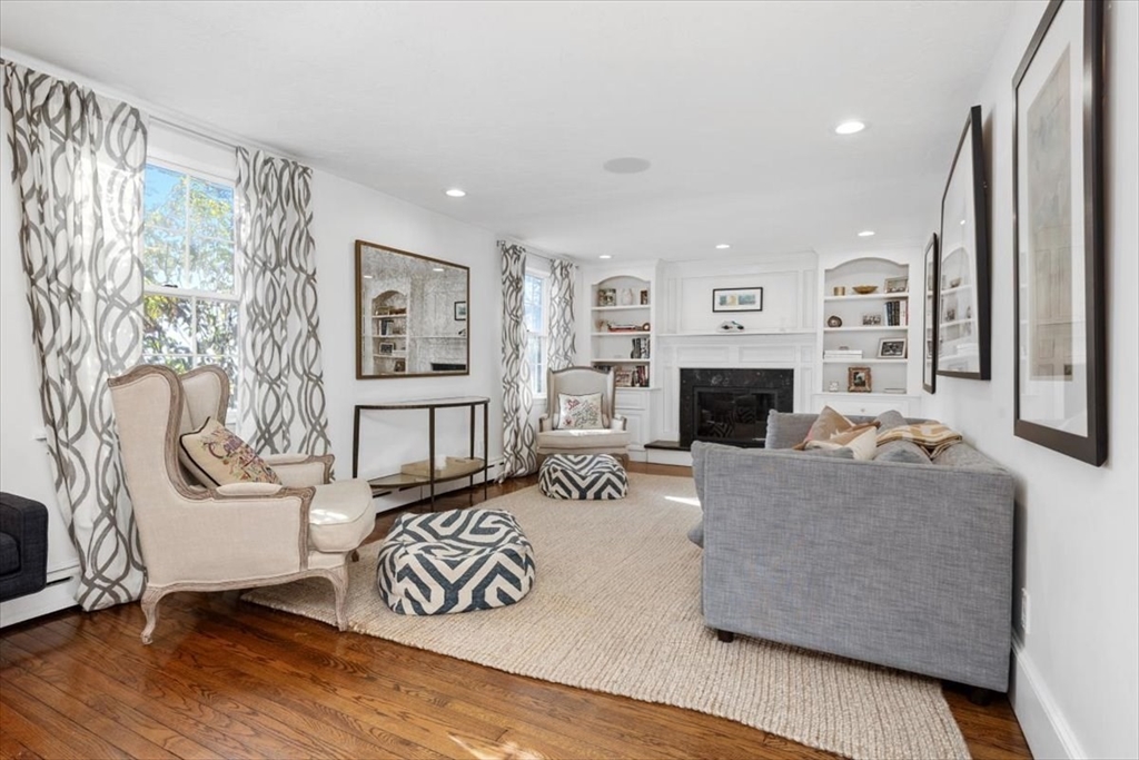 38 Smith Road Hingham, MA 02043 - Photo 5 of 42 a living room with furniture and a fireplace