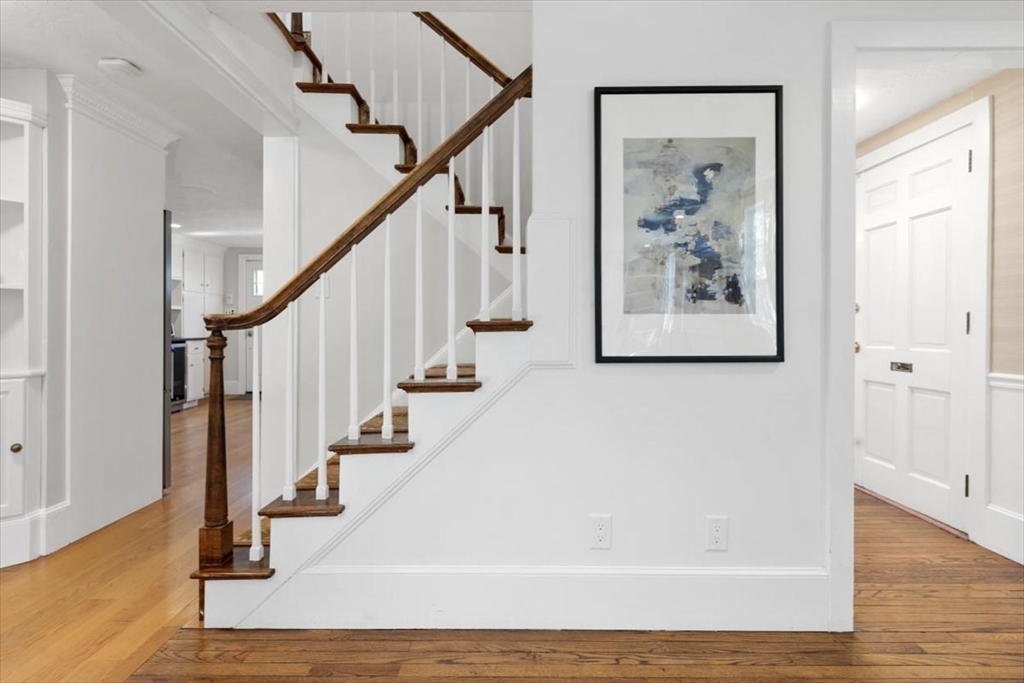 38 Smith Road Hingham, MA 02043 - Photo 6 of 42 a view of entryway and hall with wooden floor