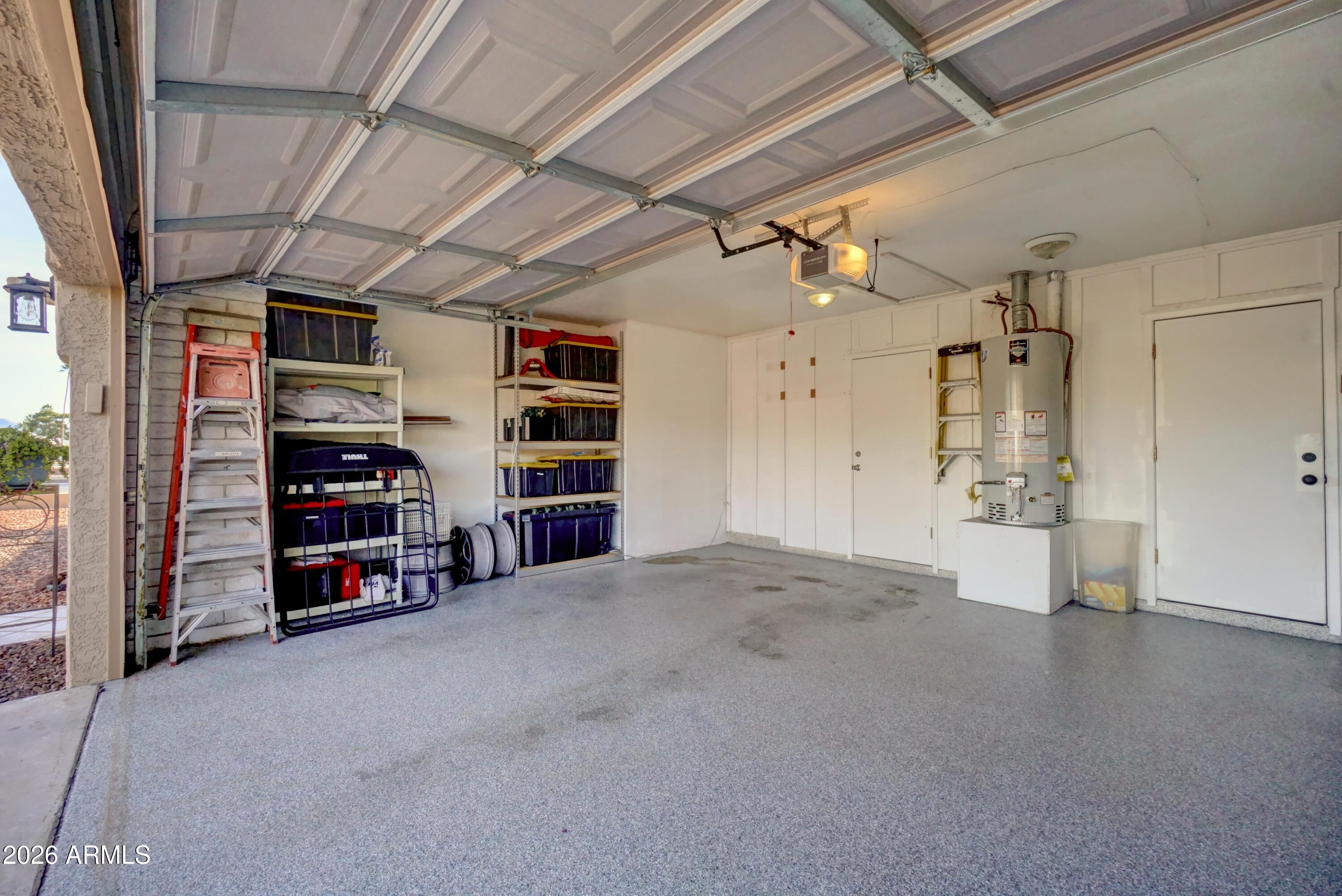 2749 East Sylvia Street Phoenix, AZ 85032 - Photo 23 of 44 a view of a car garage