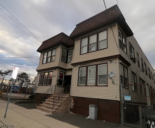 a front view of a house with a porch