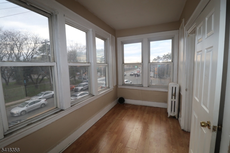 413 Lyons Avenue, Unit 2L Newark, NJ 07112 - Photo 8 of 15 a view of a room with window