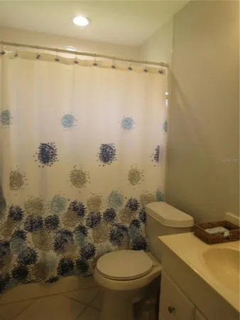 a bathroom with a sink and toilet