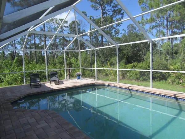 a view of outdoor space with swimming pool