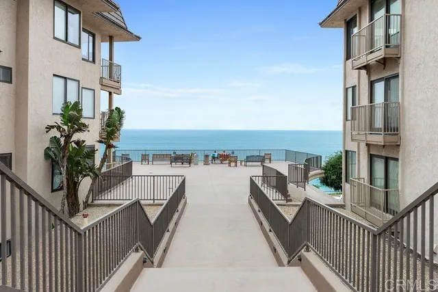 a view of balcony with furniture