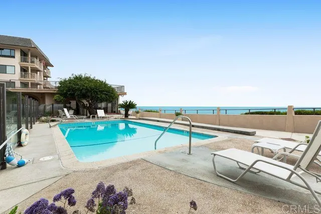 a view of swimming pool with lake view