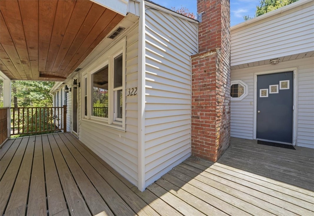 322 Rocky Hill Road Scituate, RI 02857 - Photo 7 of 50 A secondary entry provides convenient mudroom-style access—ideal for everyday living and keeping things organized.