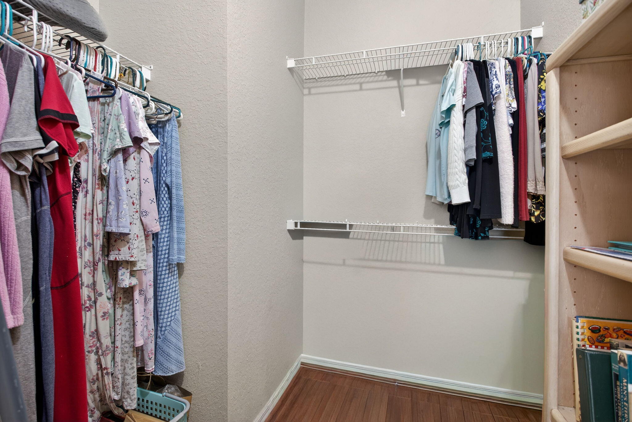 6890 West Sample Road, Unit 6890 Pompano Beach, FL 33063 - Photo 14 of 36 a view of walk in closet with clothes and shoes