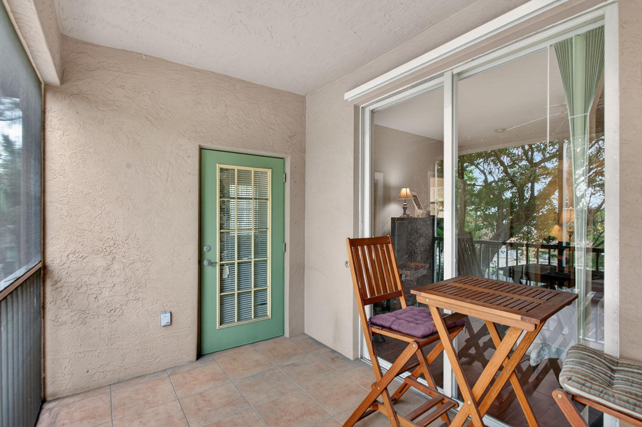 6890 West Sample Road, Unit 6890 Pompano Beach, FL 33063 - Photo 17 of 36 a view of a room with a table and chairs