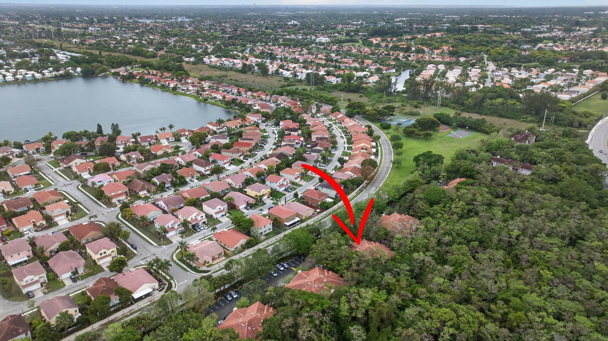 6890 West Sample Road, Unit 6890 Pompano Beach, FL 33063 - Photo 28 of 36 an aerial view of city and lake