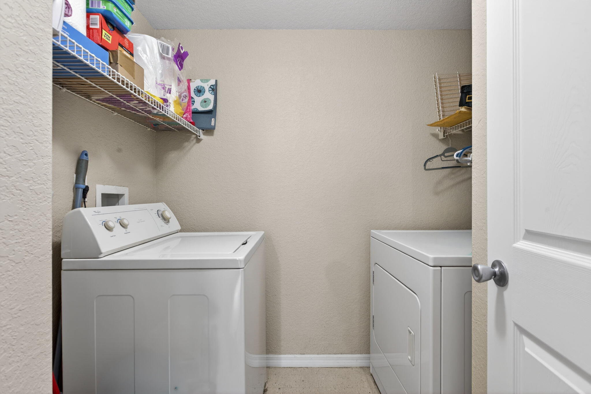 6890 West Sample Road, Unit 6890 Pompano Beach, FL 33063 - Photo 10 of 36 a utility room with dryer and washer