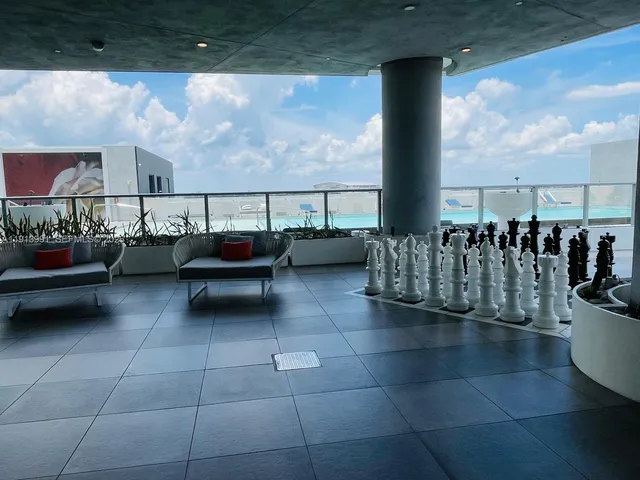 a kitchen with a sink a stove and refrigerator